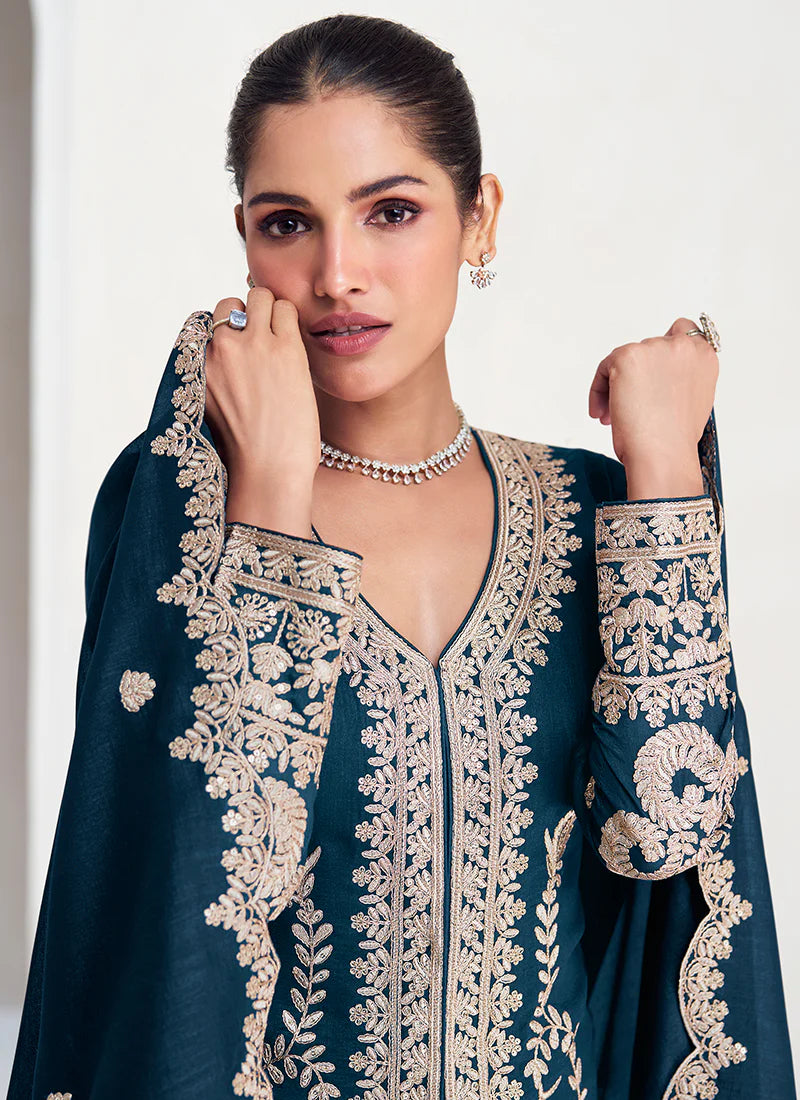 Buy designer Salwar Suit with elegant embroidery work.