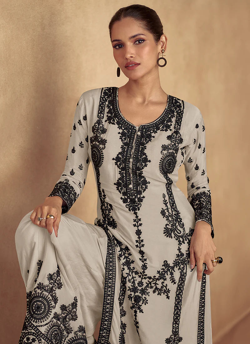Buy embroidered Palazzo Suit for weddings and festivals.