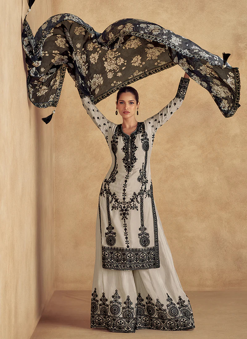 Find occasion-ready Palazzo Suit with dupatta and designer details.