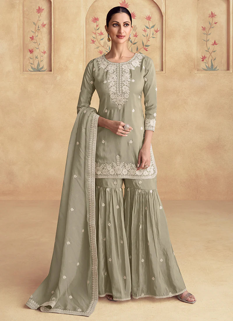 Buy Sage Green Embroidered Gharara Suit with Dupatta |Indian Festivals and Pakistani Weddings |White Resham, Zari & Sequence Work - Bindyaa Buy Sage Green Embroidered Gharara Suit with Dupatta |Indian Festivals and Pakistani Weddings |White Resham, Zari & Sequence Work - Bindyaa
