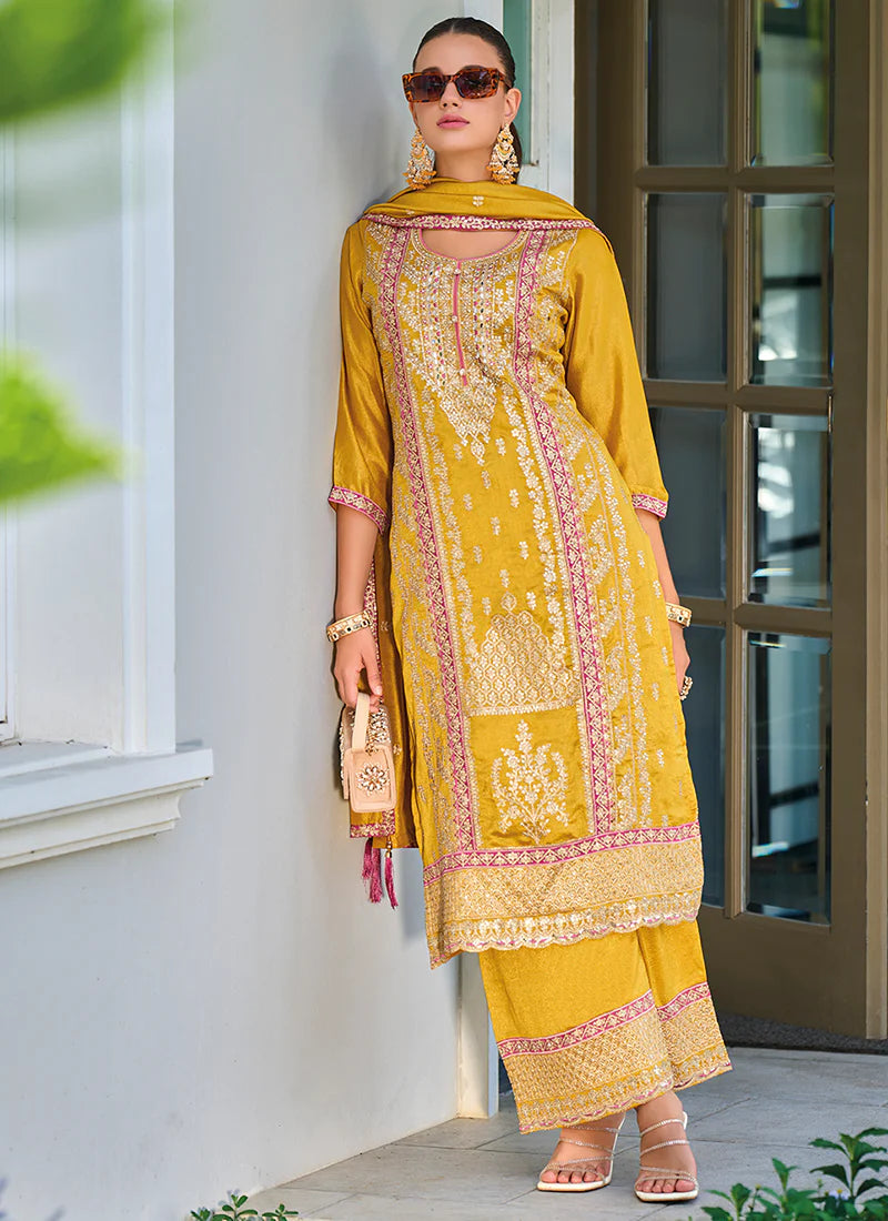 Buy designer Pakistani Suit with elegant embroidery work.