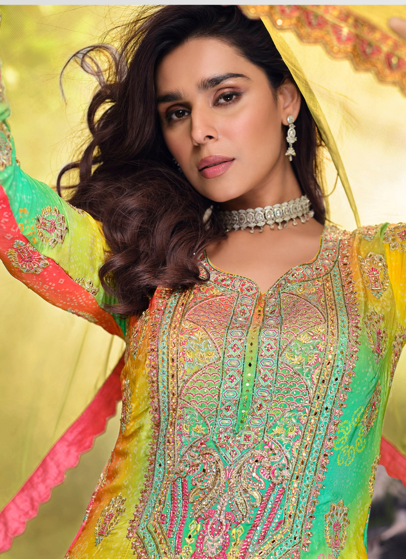 Shop stylish Anarkali Gown and Sharara Suit for festive wear.