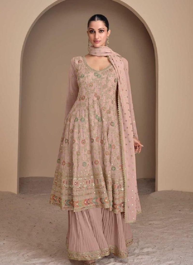 Find occasion-ready Sharara Suit with dupatta and designer details.