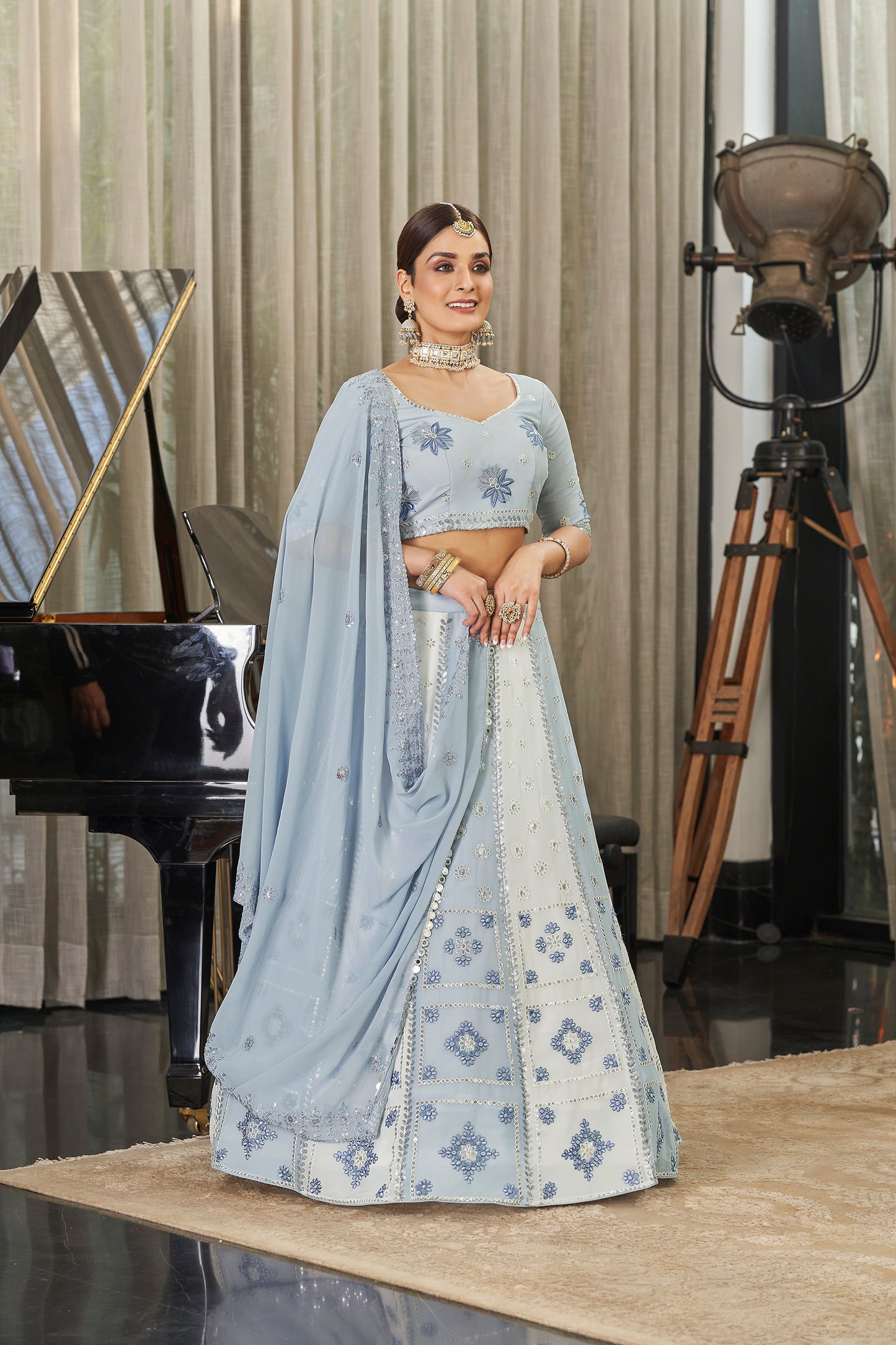 Buy designer Lehenga Choli with elegant embroidery work.