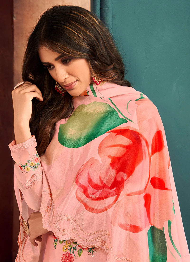 Find occasion-ready Pakistani Suit with dupatta and designer details.