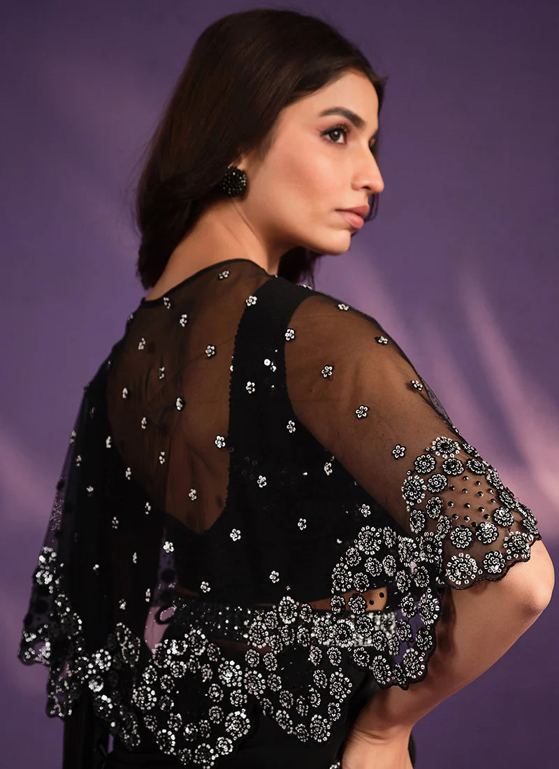Find occasion-ready made party wear saree designer details.