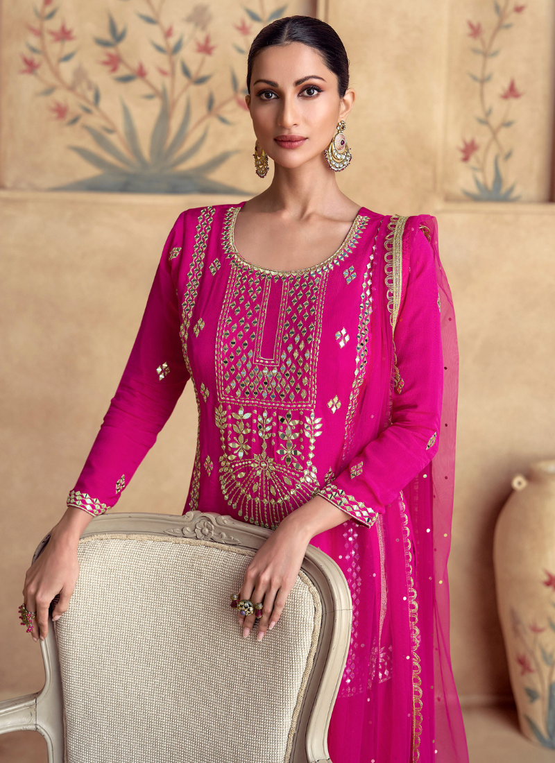Find occasion-ready Sharara Suit with dupatta and designer details.