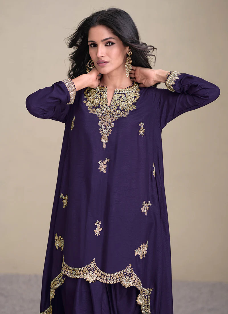 Find occasion-ready Pakistani Suit with dupatta and designer details.