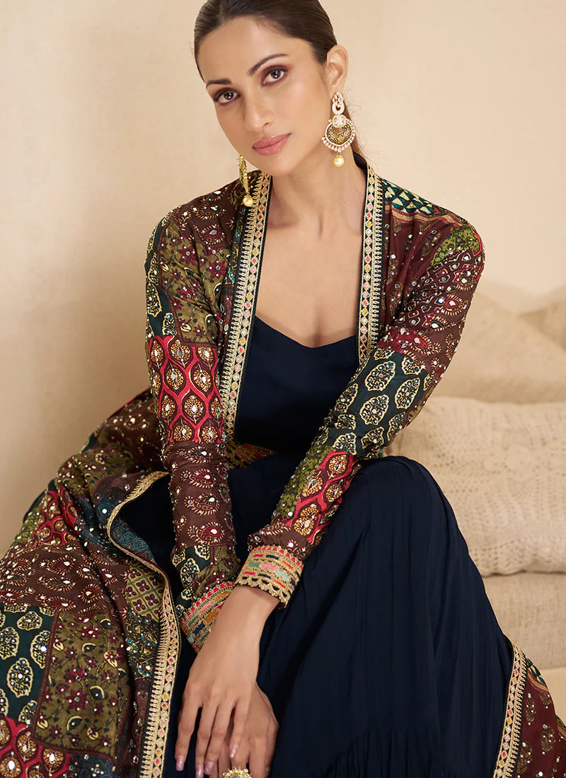 Buy designer Gown Anarkali with Jacket featuring elegant embroidery work.