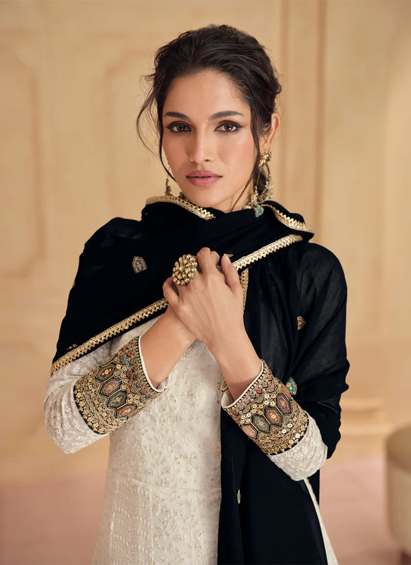 Buy designer Gown with elegant embroidery work.