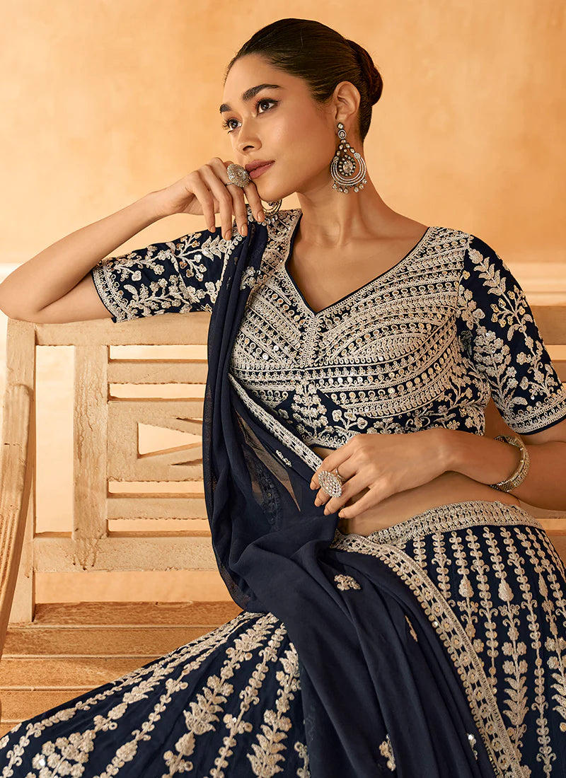 Buy designer Jacket Style Lehenga with elegant embroidery work.