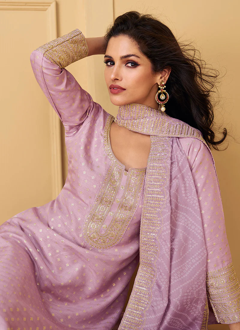 Buy designer Salwar Suit with elegant embroidery work.