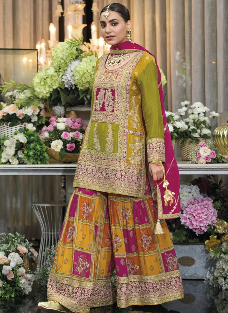 Buy designer Sharara Suit with elegant embroidery work.