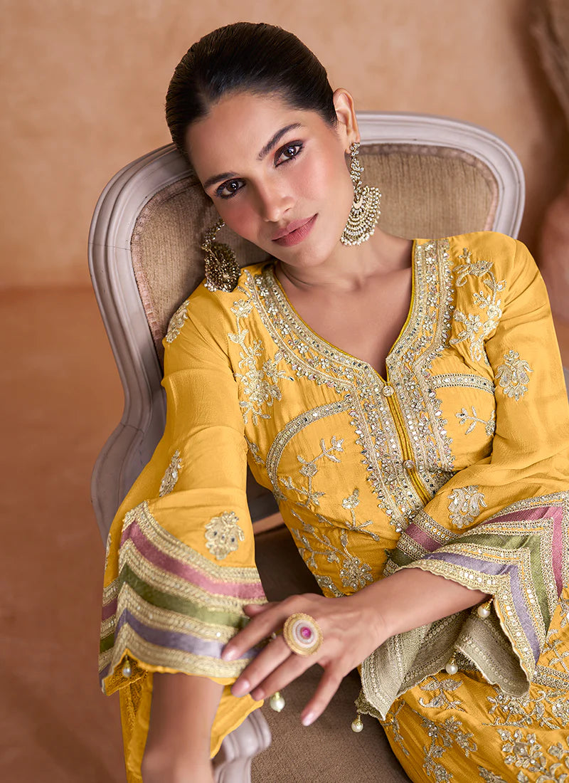 Find occasion-ready Pakistani Suit with dupatta and designer details.