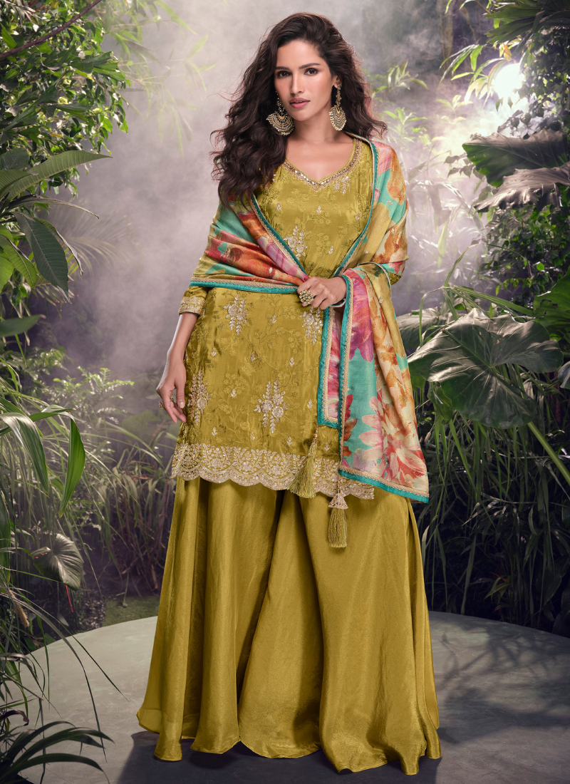 Find occasion-ready Sharara Suit with dupatta and designer details.