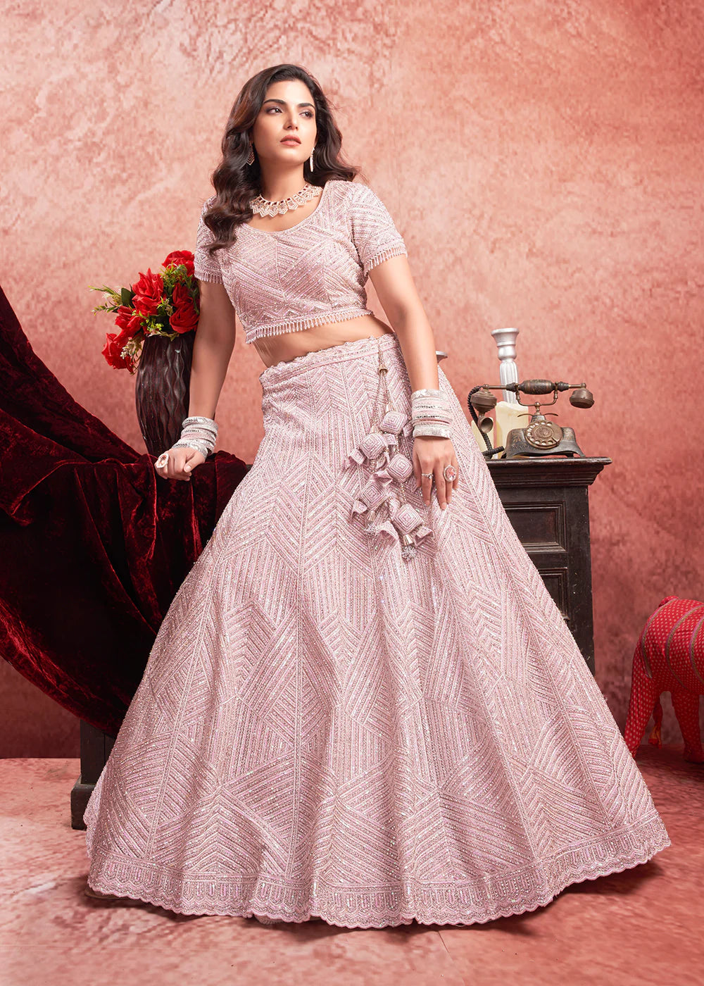 Find occasion-ready Lehenga Choli with dupatta and designer details.