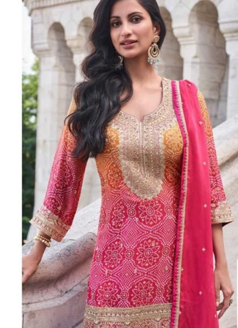 Buy designer Sharara Suit with elegant embroidery work.
