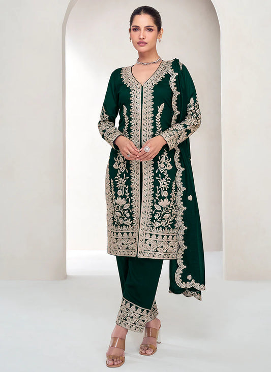 Stylish Green Silk Salwar Kameez with Embroidered Details