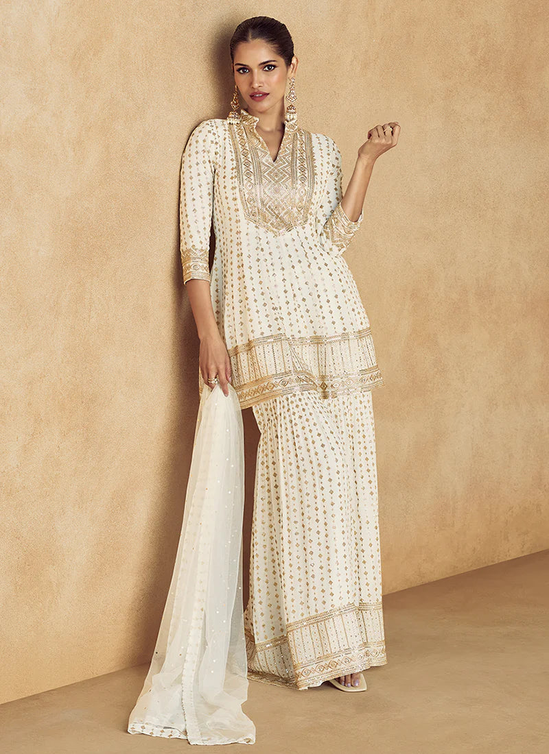 Elegant Off White Embroidered Peplum Sharara Suit