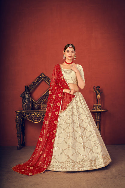 Beige  silk lehenga choli featuring red thread and sequence embroidery