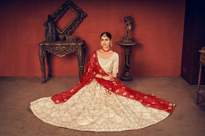 Beige  silk lehenga choli featuring red thread and sequence embroidery