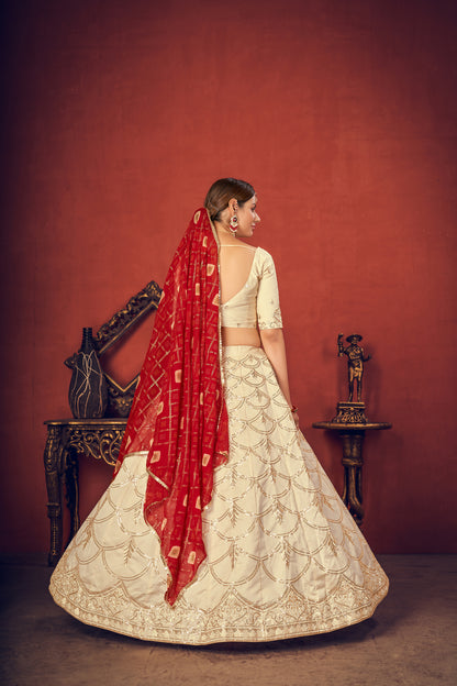 Beige  silk lehenga choli featuring red thread and sequence embroidery