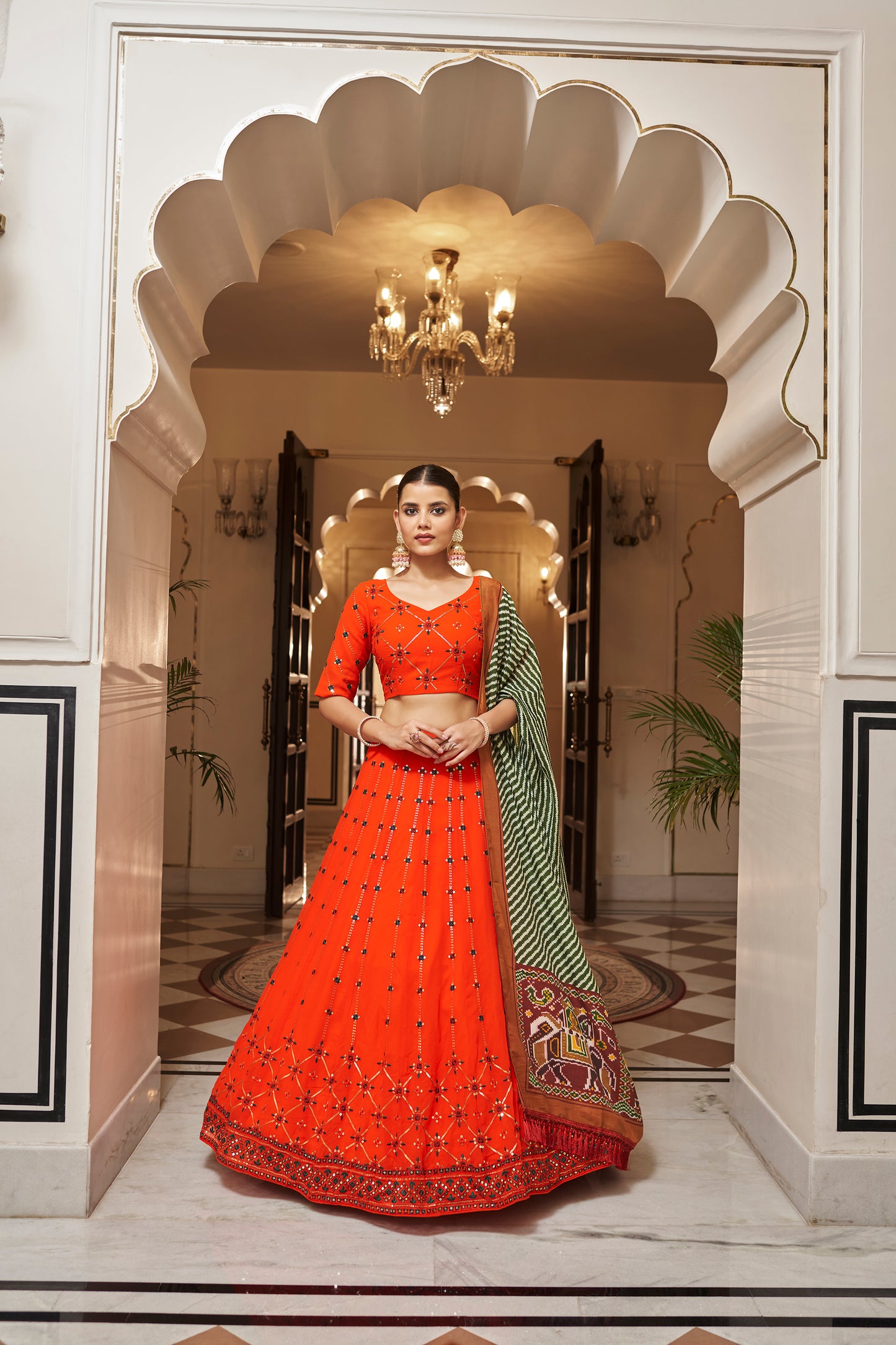 Orange Georgette Sequins Embroidery Work Lehenga Choli