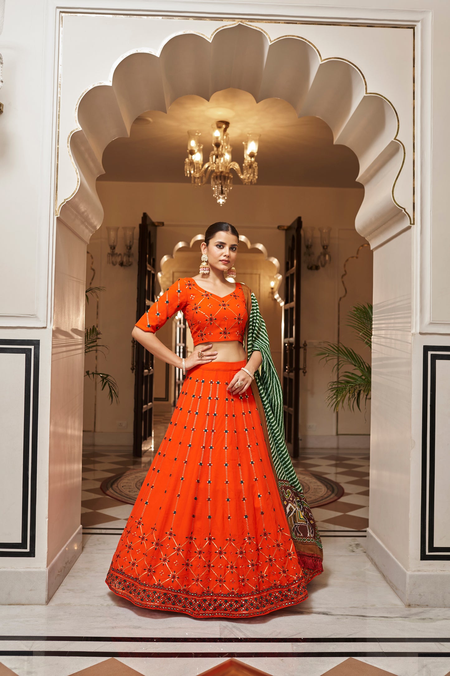 Orange Georgette Sequins Embroidery Work Lehenga Choli