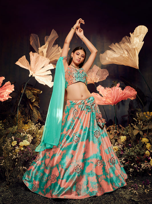 Turquoise Orange Velvet Lehenga Choli features elegant sequin embroidery