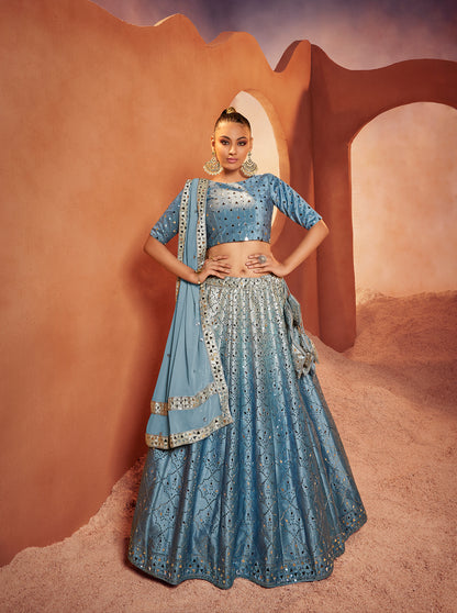 Dusty Sky Mirror Work Lehenga Choli showcases mirror embroidery on velvet