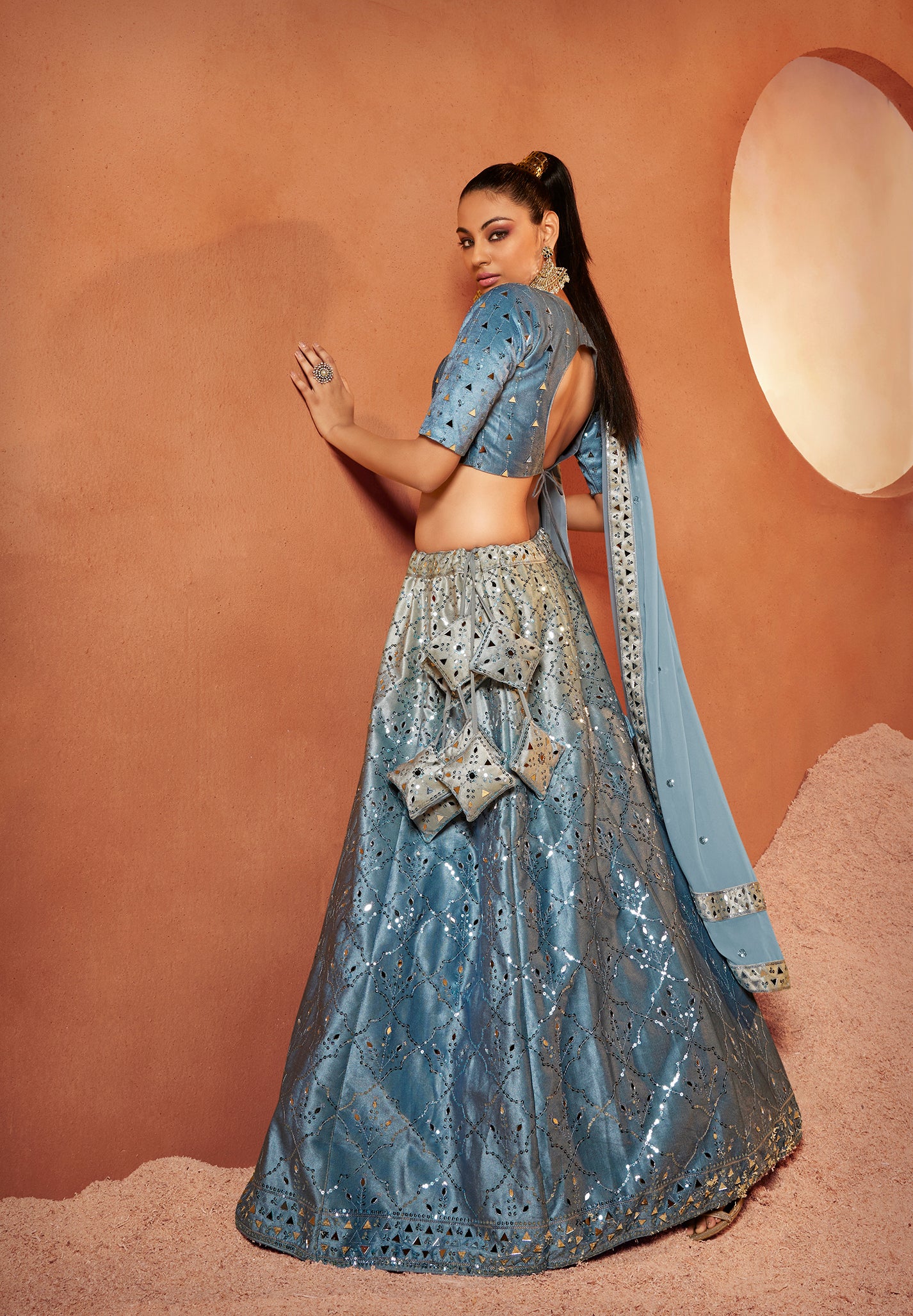 Dusty Sky Mirror Work Lehenga Choli showcases mirror embroidery on velvet