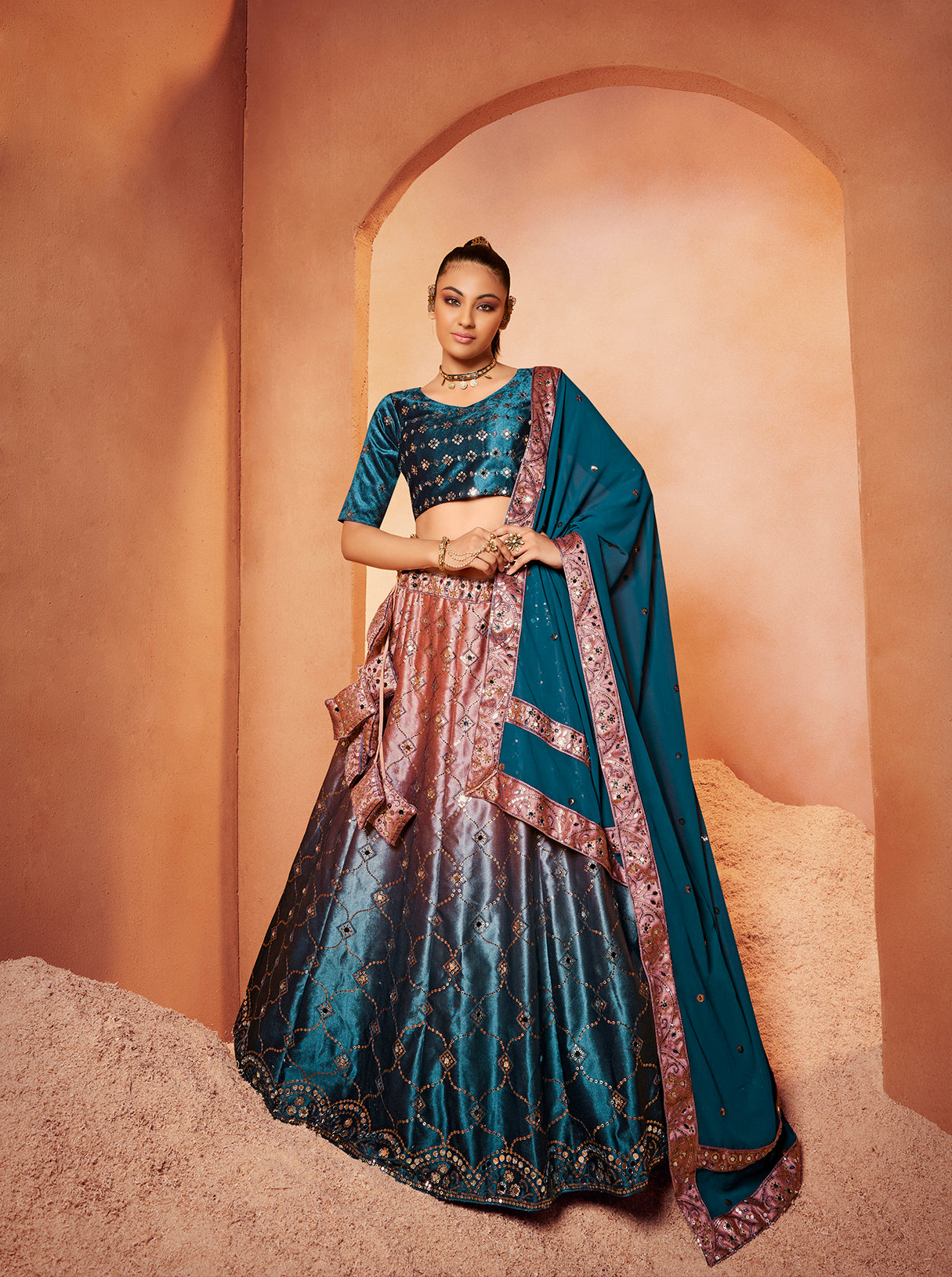 Teal Blue Mirror Work Lehenga Choli showcases mirror embroidery on velvet