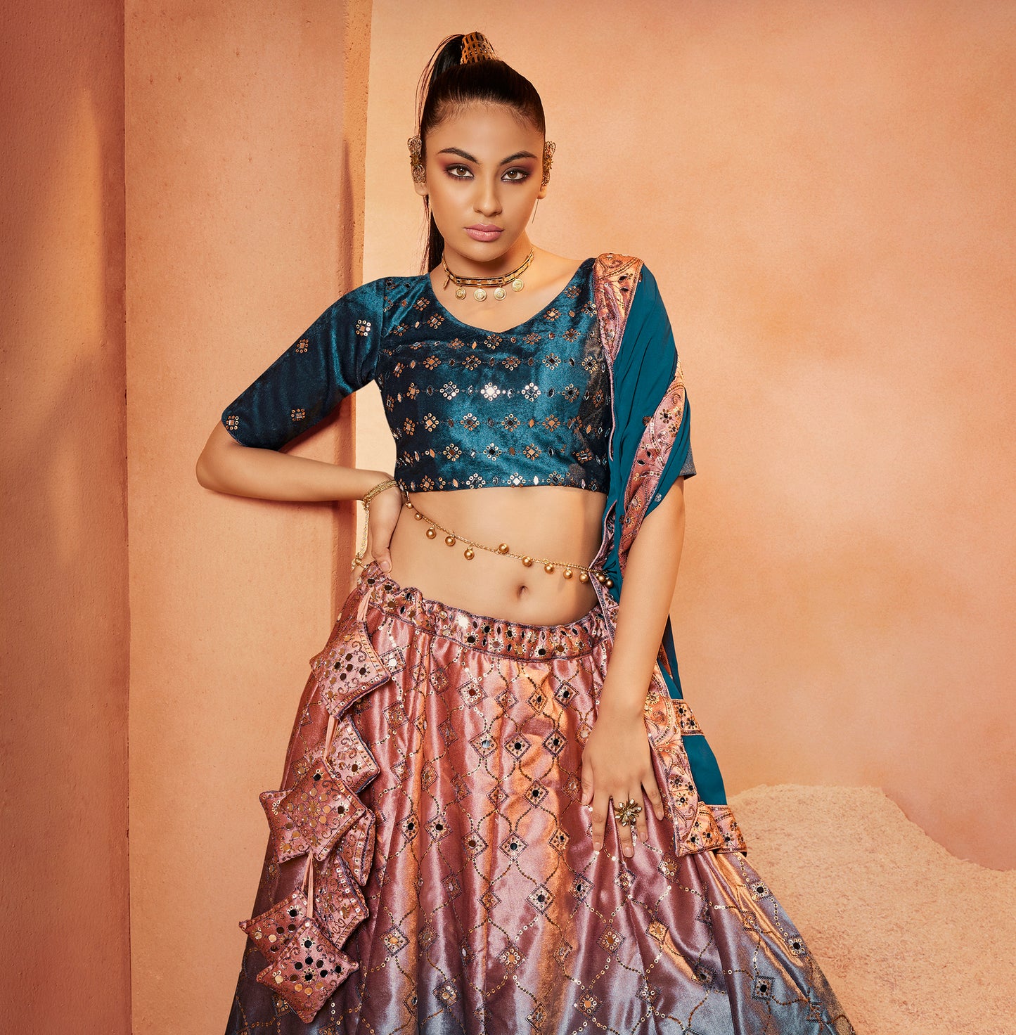 Teal Blue Mirror Work Lehenga Choli showcases mirror embroidery on velvet