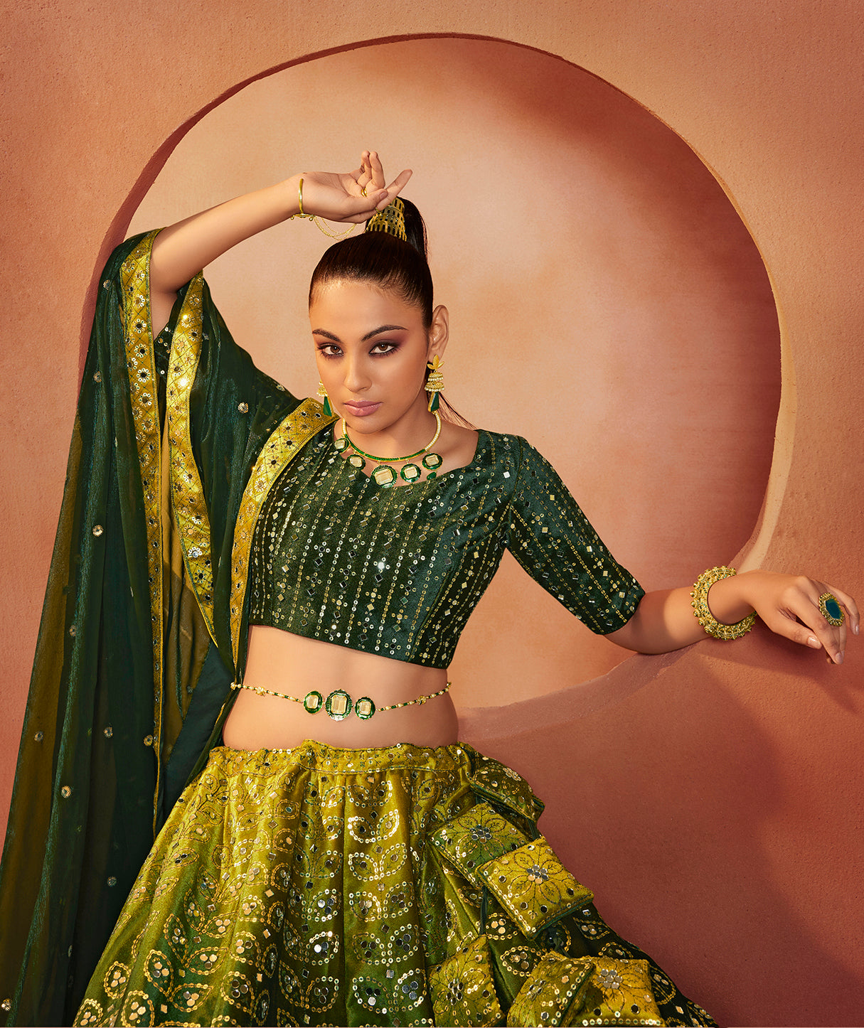 Green Mirror Work Lehenga Choli showcases mirror embroidery on velvet