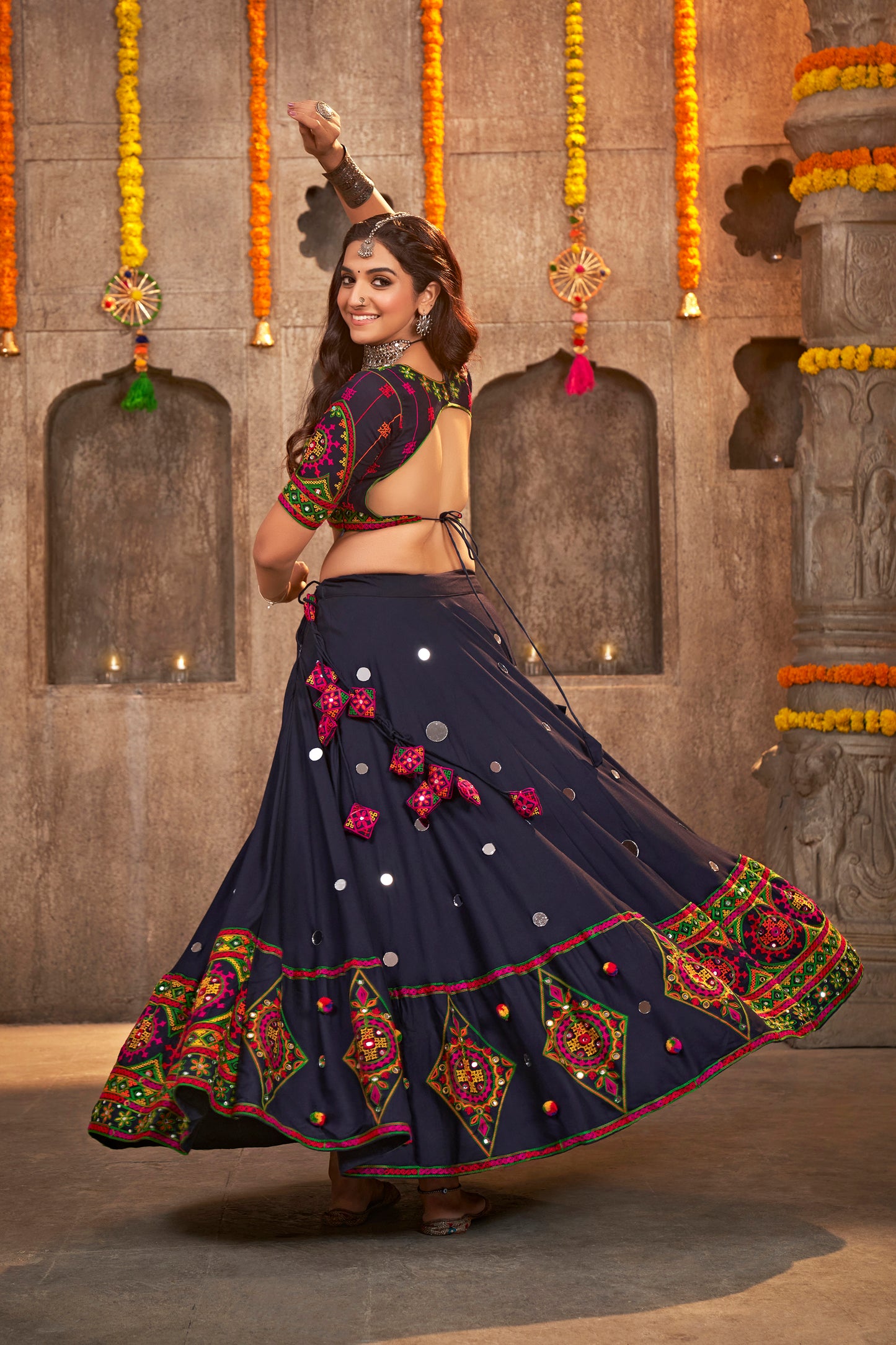 Navy blue rayon chaniya choli with mirror embroidery, perfect for Navratri