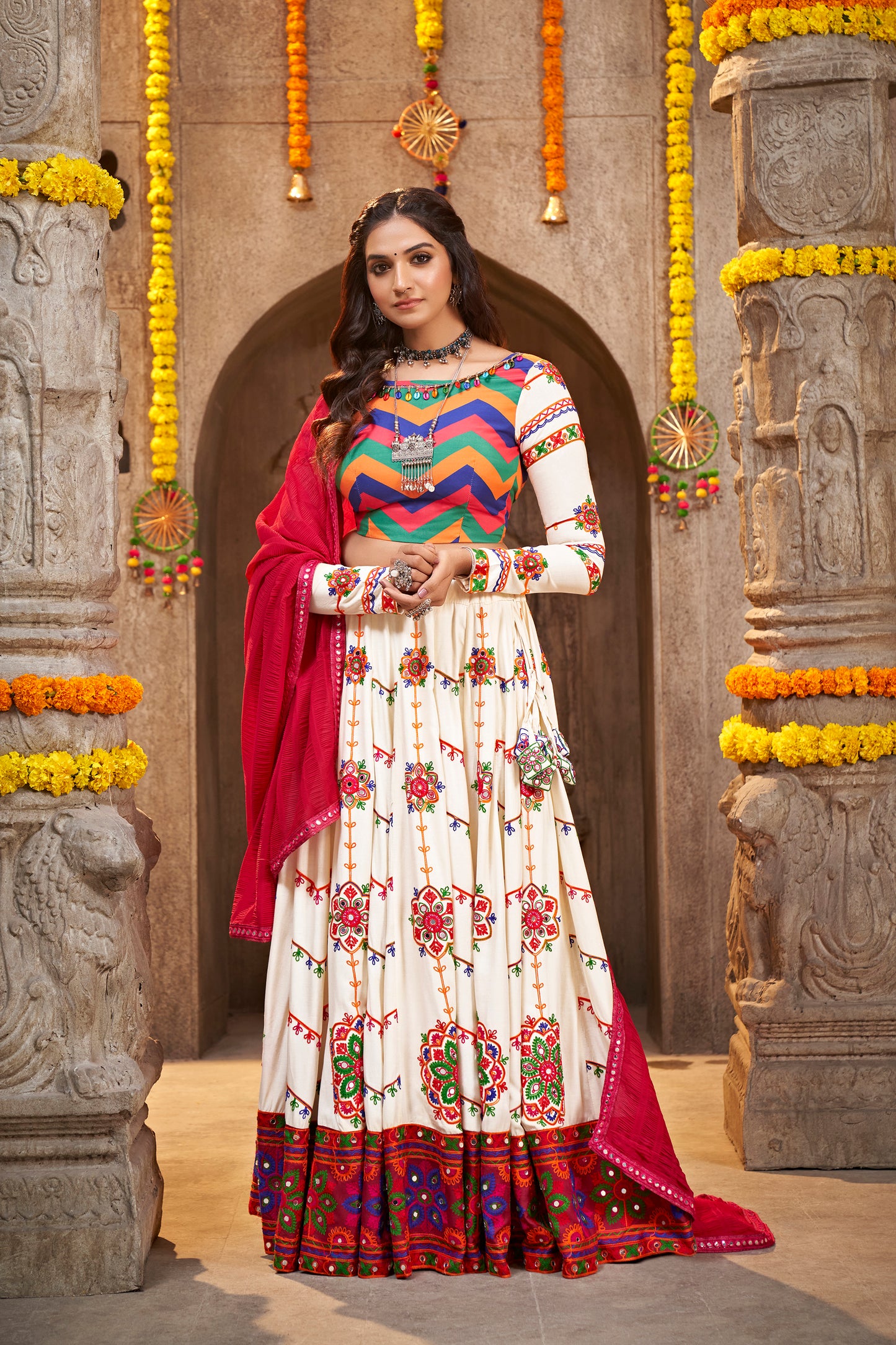 White chaniya choli collection with detailed embroidery, crafted for a stunning Navratri look