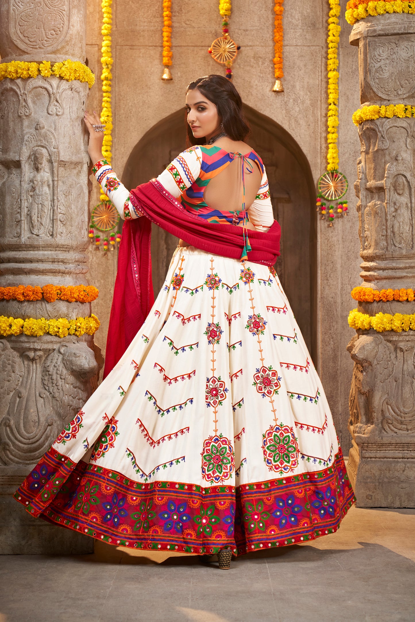 White chaniya choli collection with detailed embroidery, crafted for a stunning Navratri look