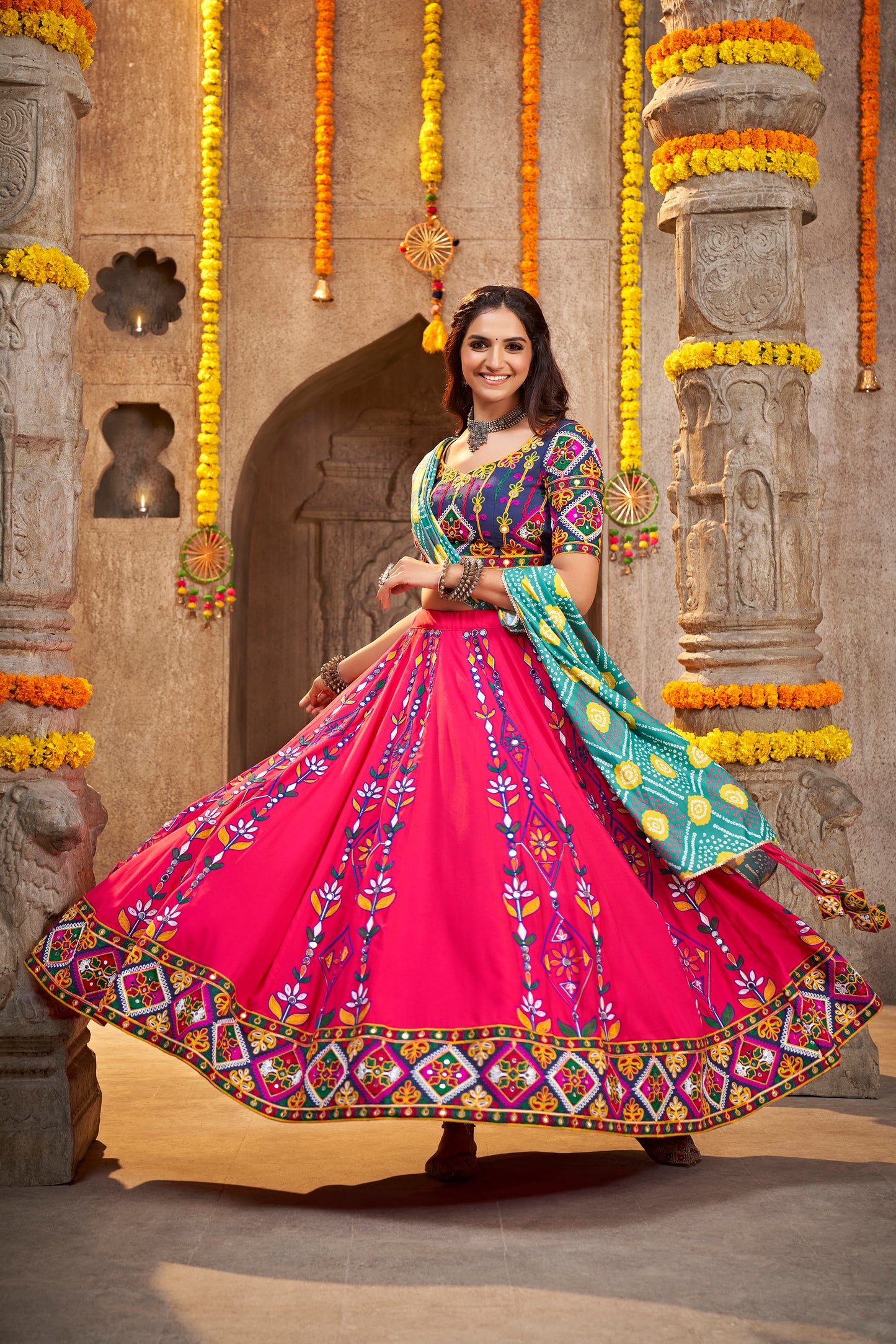 Pink Rajwadi chaniya choli with elaborate Kutchi embroidery