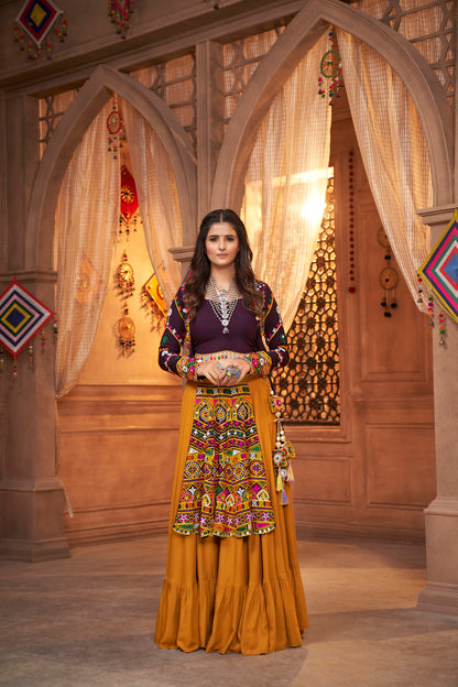 Yellow and Purple Kutchi Chaniya Choli features intricate embroidery and mirror work