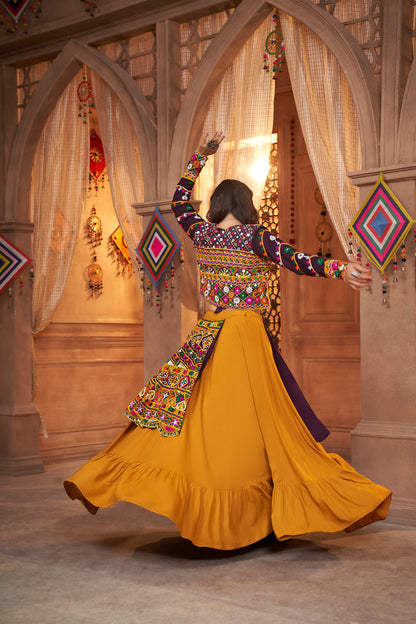 Yellow and Purple Kutchi Chaniya Choli features intricate embroidery and mirror work