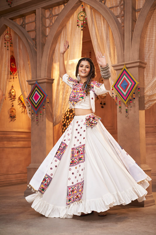 White Kutchi Chaniya Choli features intricate embroidery and mirror work