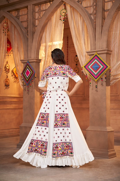 White Kutchi Chaniya Choli features intricate embroidery and mirror work