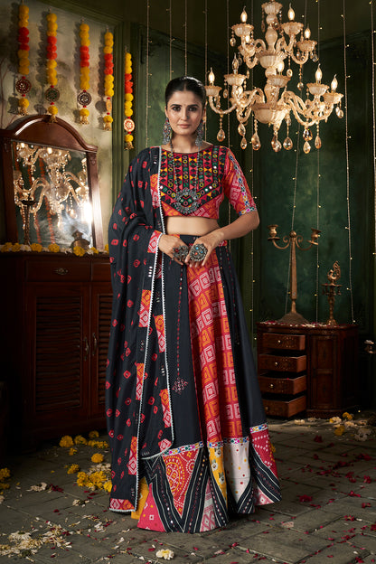 Stunning black cotton lehenga choli with mirror work, perfect for Navratri