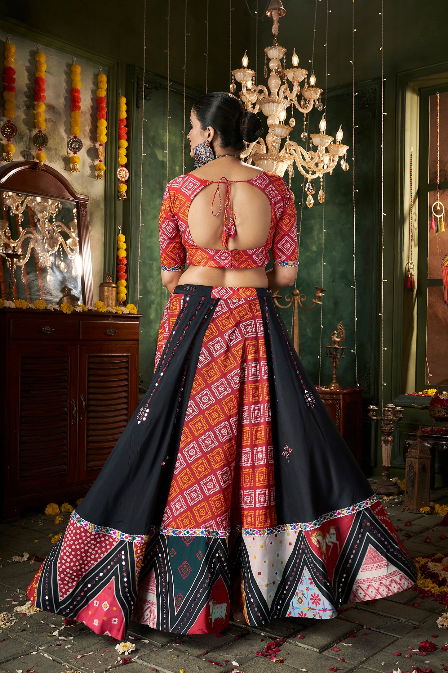 Stunning black cotton lehenga choli with mirror work, perfect for Navratri