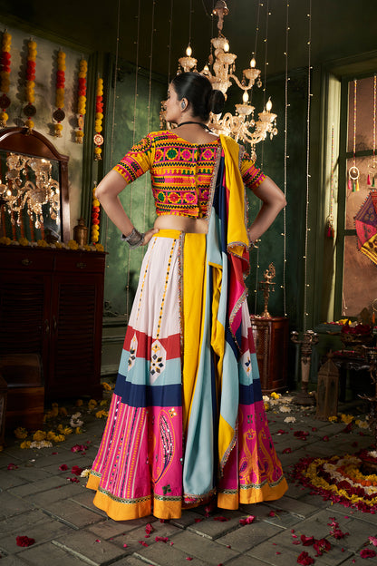 Multicolor printed ghagra choli with traditional mirror work, ideal for Navratri celebrations