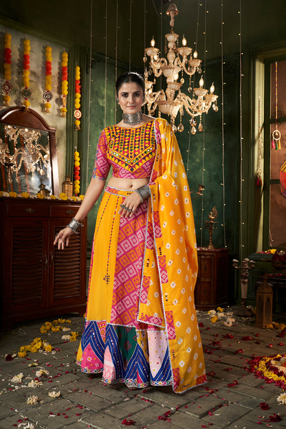 Yellow ghagra choli with traditional mirror work, ideal for Navratri celebrations