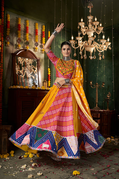 Yellow ghagra choli with traditional mirror work, ideal for Navratri celebrations