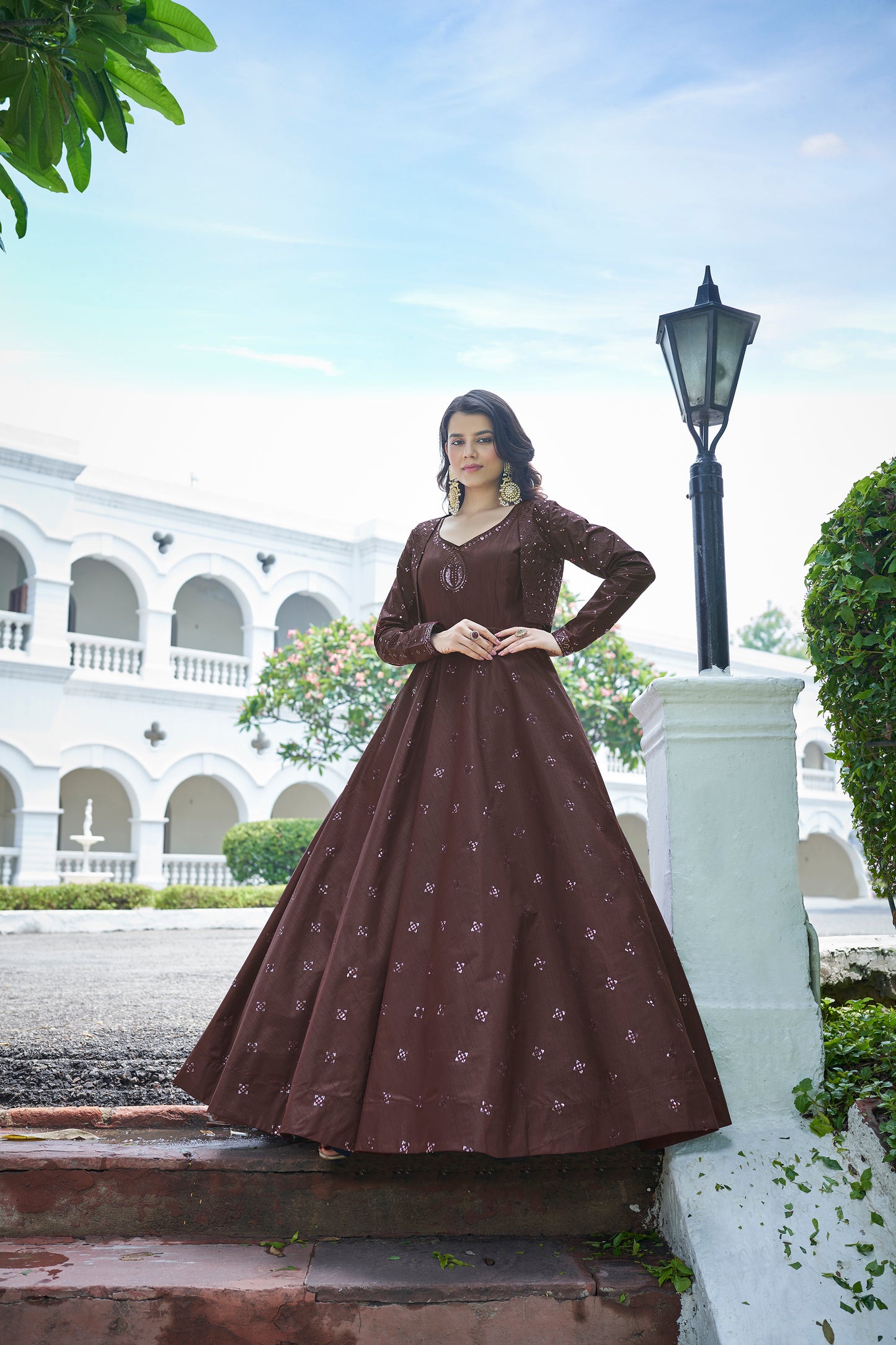 Elevate your festive look with the Deep Maroon Sequence Embroidered Anarkali Gown