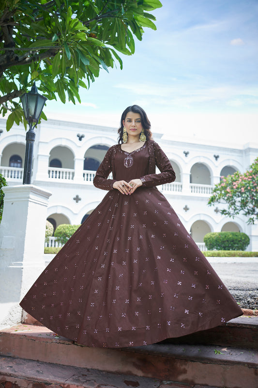 Elevate your festive look with the Deep Maroon Sequence Embroidered Anarkali Gown