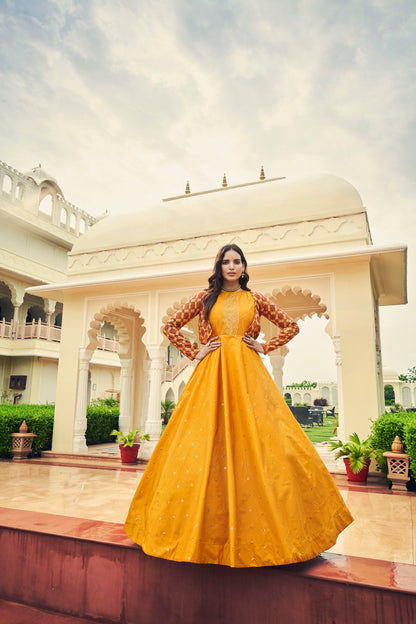 Mustard Yellow Anarkali Gown with Jacket features sequin and resham embroidery